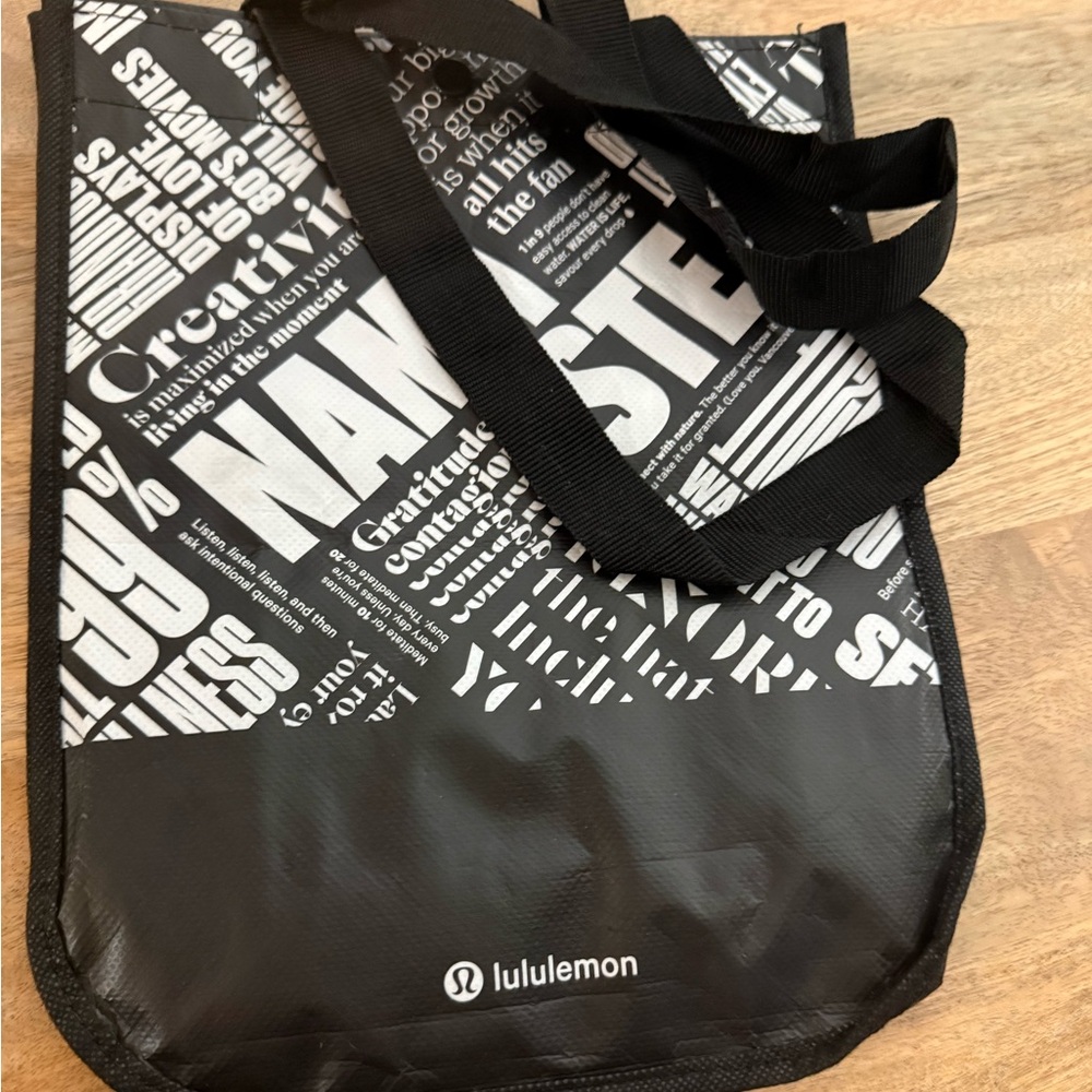 lululemon athletica black, white and red small Tote Bags (set 3)
